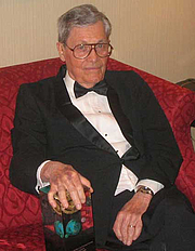 Author photo. James Edwin Gunn, SF author,<br> at the 2006 Nebula Awards<br> held in New York City, 2007 <br>Copyright © 2007 <a href="http://ronhogan.tumblr.com">Ron Hogan</a>