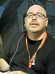 Author photo. Signing at DC Comics booth, Comic-Con International 2009, photo by Loren Javier