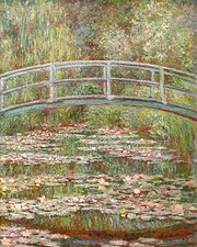 Bridge over a pond of water lilies…